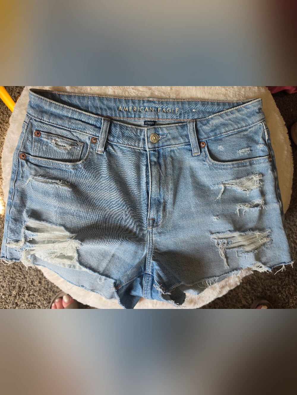 American Eagle Outfitters light blue ripped denim cutoff shorts